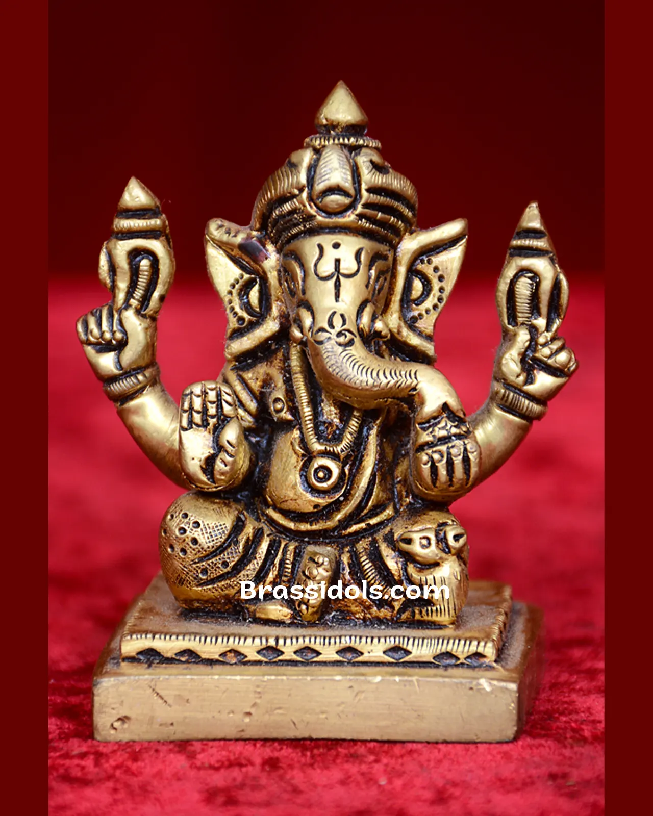 Brass small sitting Ganesh idol - 2.5 inches - image 1